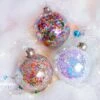 Lot De 12 Boules De Noël (D80 Mm) En Verre Sequins Transparent -Village de Noel lot de 12 boules de no l d80 mm en verre sequins transparent 129181 1687354075