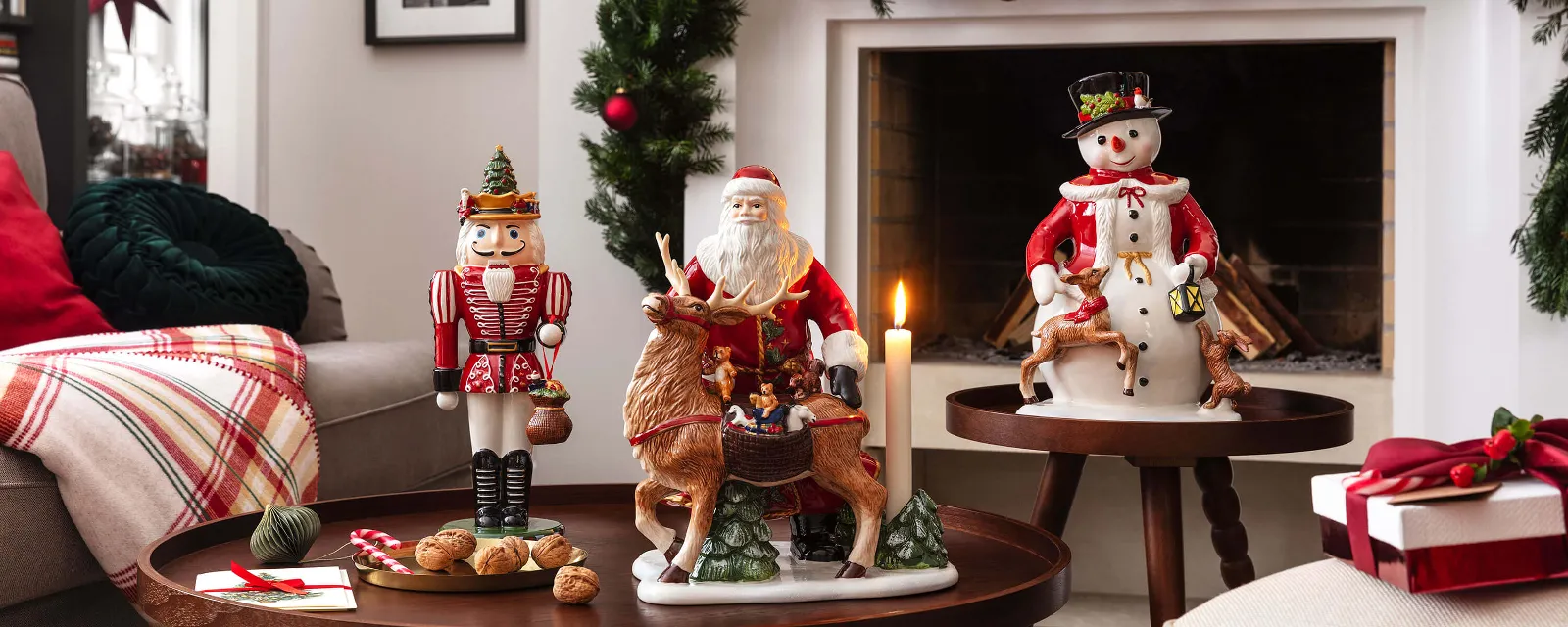 Village de Noel -Village de Noel christmas toys memory figurines in front of festively decorated fireplace